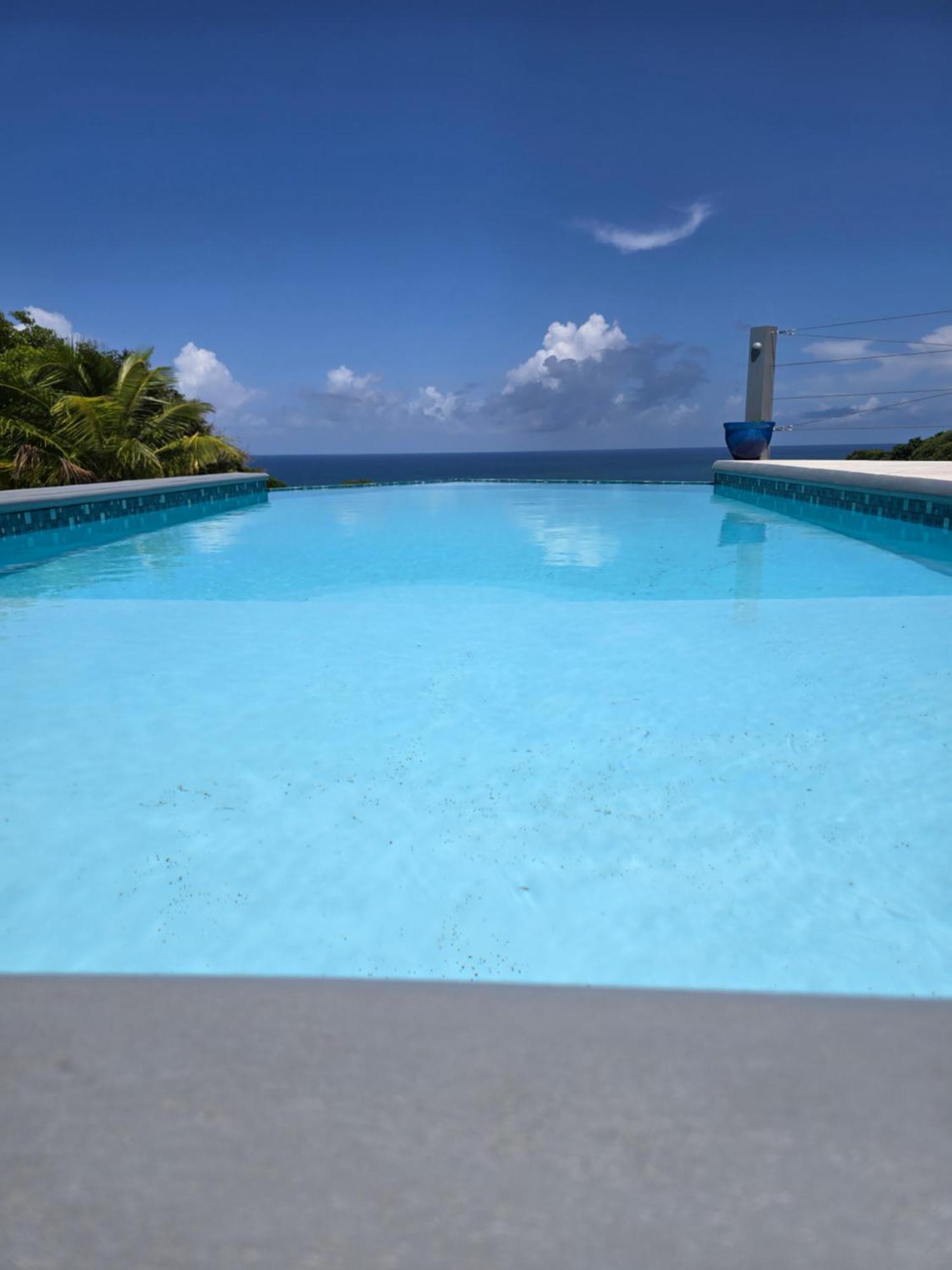 Hodges Bay House Apartment Calibishie ภายนอก รูปภาพ